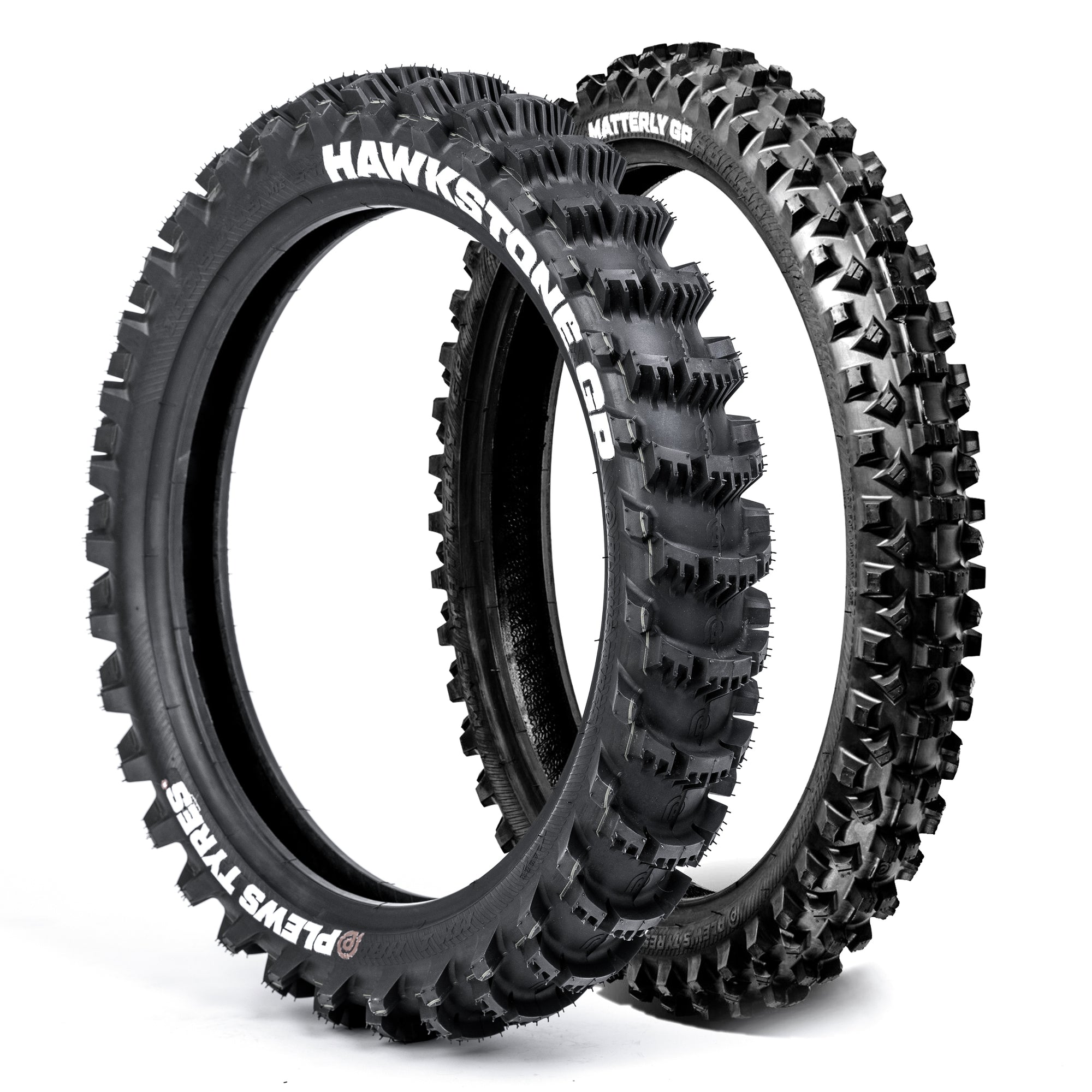 Two black off-road dirt bike tires with visible Plews branding on a white background